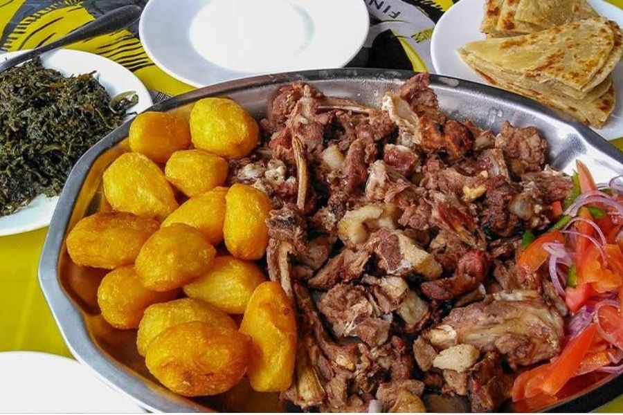 A colorful display of Kenya’s most beloved traditional foods, showcasing the diversity and depth of its culinary culture. A vibrant spread of traditional Kenyan dishes, including nyama choma, pilau, sukuma wiki, and chapati, served on a wooden table.